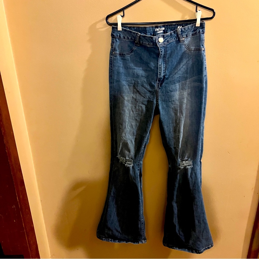 Bell Bottom Style Distressed Jeans
